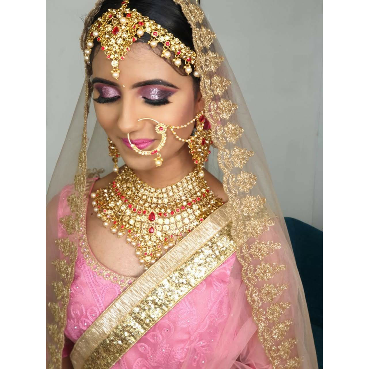 A Gorgeous Bride In Embroidered Pastel Pink Lehenga